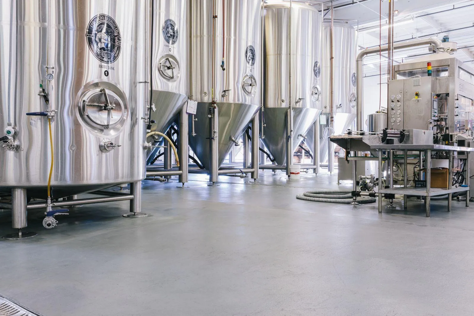 Seamless flooring in an industrial food and beverage facility